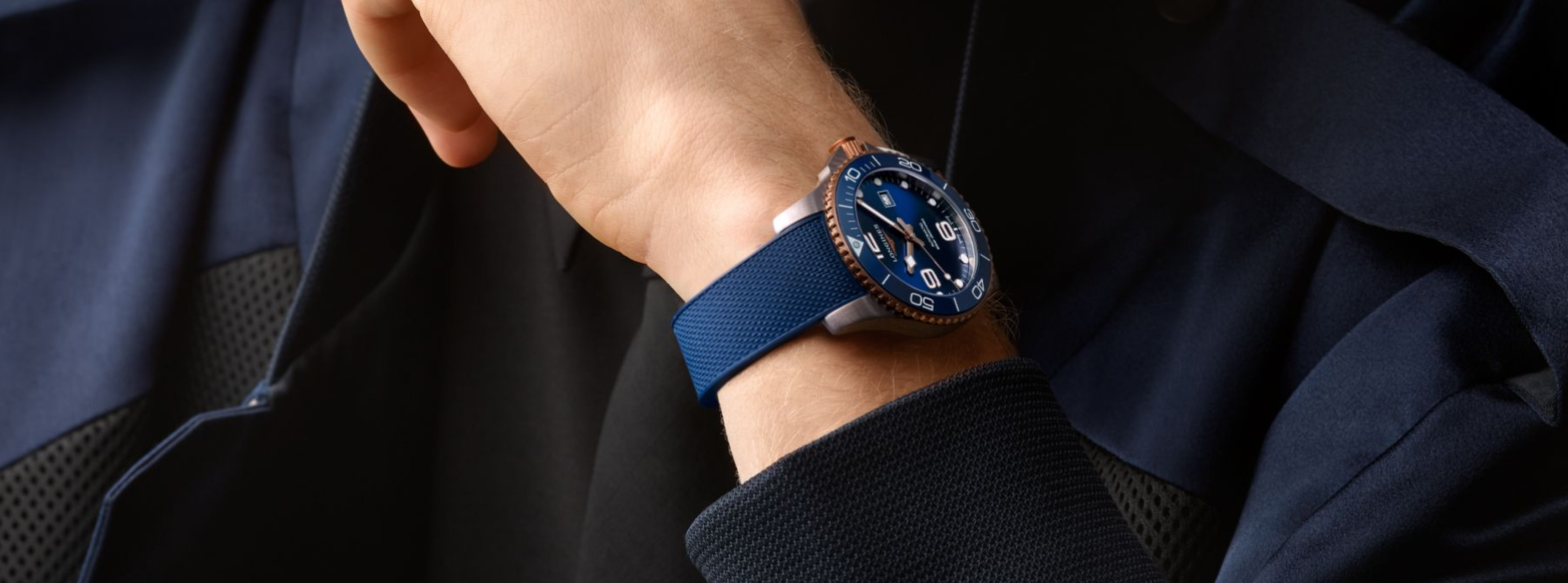 Blue watch on a man’s hand, photo shoot for the design of the Watch approach company
