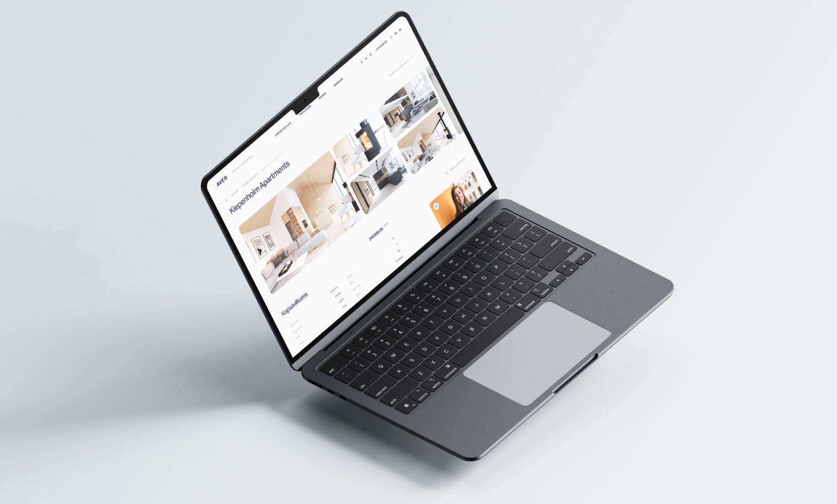 Серый ноутбук отображает на экране сайт компании Aver